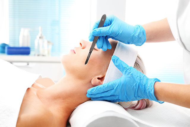 Dermaplaning skin exfoliation